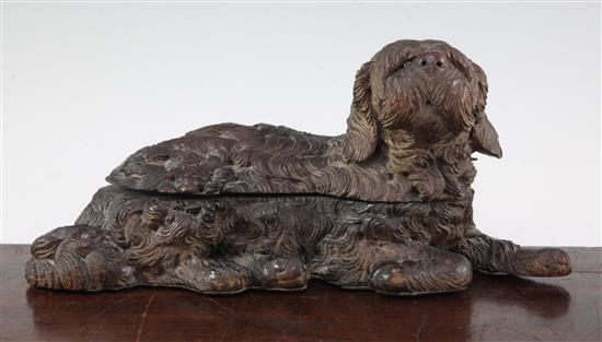 A late 19th / early 20th century Black Forest carved double inkwell, 12in.